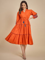 Women Orange Solid Tiered Dress with Tassel Detail