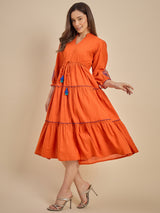 Women Orange Solid Tiered Dress with Tassel Detail