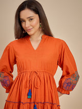 Women Orange Solid Tiered Dress with Tassel Detail